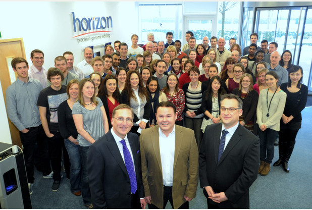 CSO Chris Torrance, CEO Darrin Disley and COO Dan Cowell with some of the staff following the Royal visit of the Duke of Kent in January 2013 (Credit: Keith Heppell)