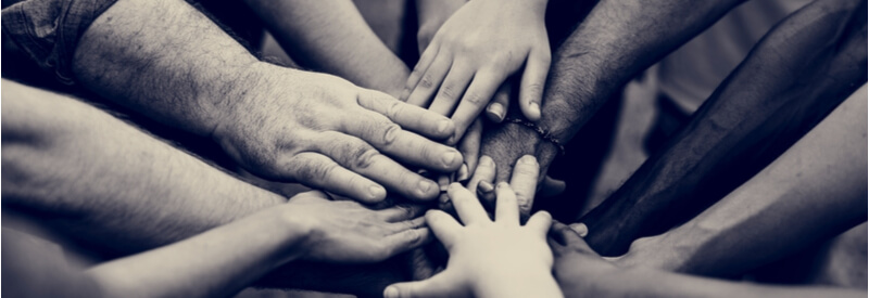 group of people, holding hands