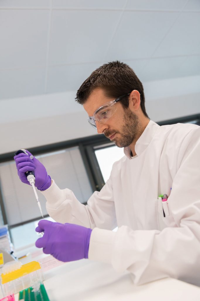 tech transfer, lab work, scientist, researcher, biotech, Merck