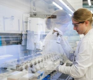 large molecule manufacturing: Lonza woman working in laboratory